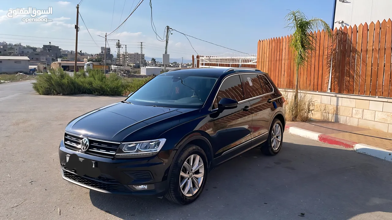 جيب تيجوان بنزين ماطور 2000 190hpصنع شهر6 2020 ولا غرام بوية ترخيص+تأمين شامل سنة كاملة لشهر 10/2026