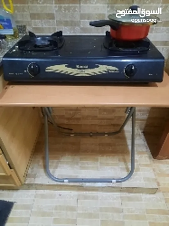 Gas stove along with table