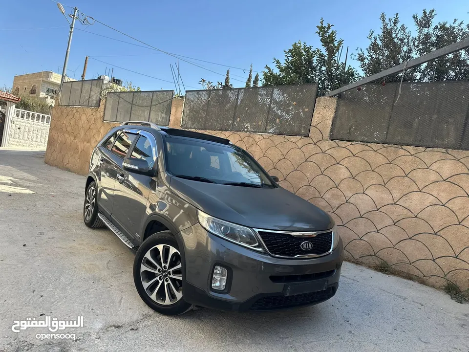 كيا سرنتو 2015ترخيص2014 للبيع المعني حيا الله ترخيص وتأمين هديه سنه الجب بحاله ممتازه  فل الفل الجيب