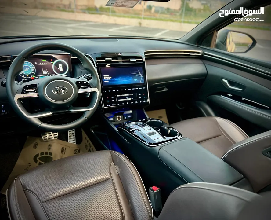 هونداي توسان/2022 فل الفل بدون فتحة سقف  2x4 ///240Hp بنزين + كهرباء  ( Haybrid) 1600cc