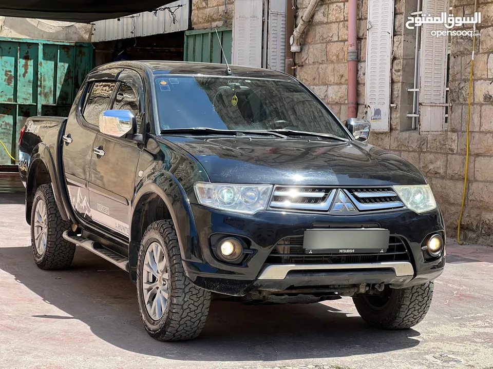 ميتسوبيشي هنتر 2015  اصل برايفت فحص ممتاز يد اولى    اتومات 4x4  رخصة وتامين شامل 6 ش