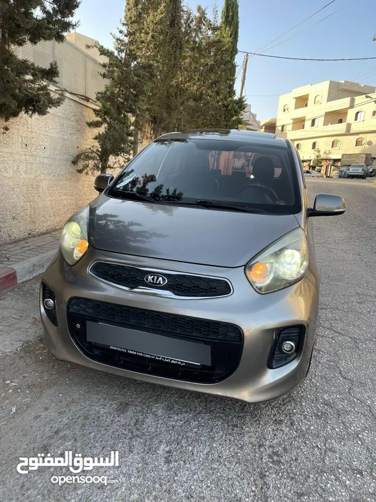 كيا مورننغ جي تي مع فتحة