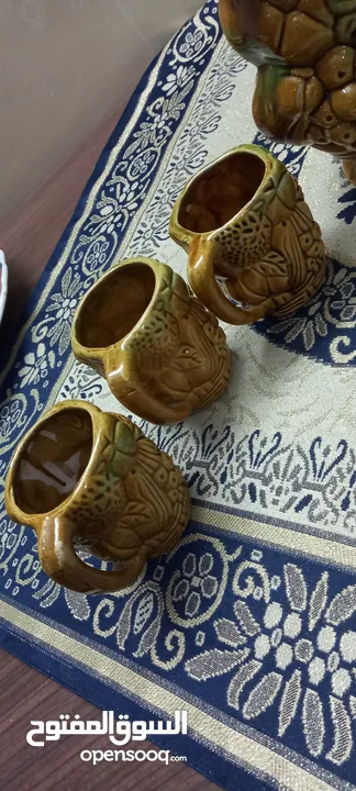 طقم ابريق و 6 كاسات فخار انتيك