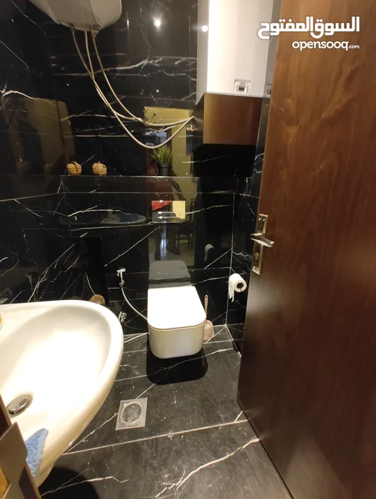 Deluxe Apartment for sale in Al Rawnaq