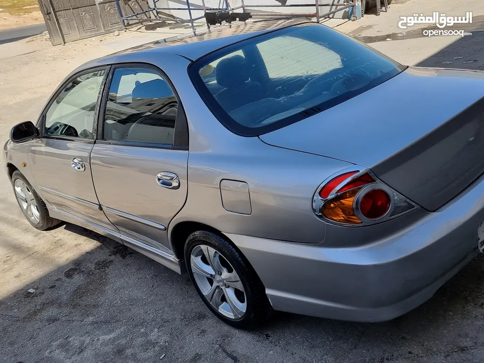 كيا سبيكترا 2001 بسعر 2400 جير عادي سياره نظيفه جدا  kia spectra 2001