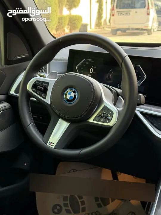 BMW X5 50e ترخيص   محرك 3000 هايبرد plug in/يقطع على الشحنه 100 كيلو متر