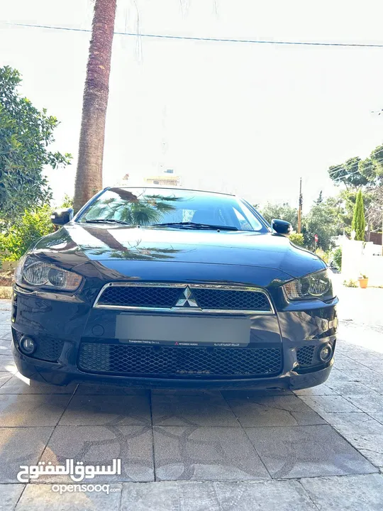 ميتسوبيشي لانسر EX 2016 وكالة الشركة التجارية الاردنية  بحالة ممتازة جدا مالك واحد فقط 10200 دينار
