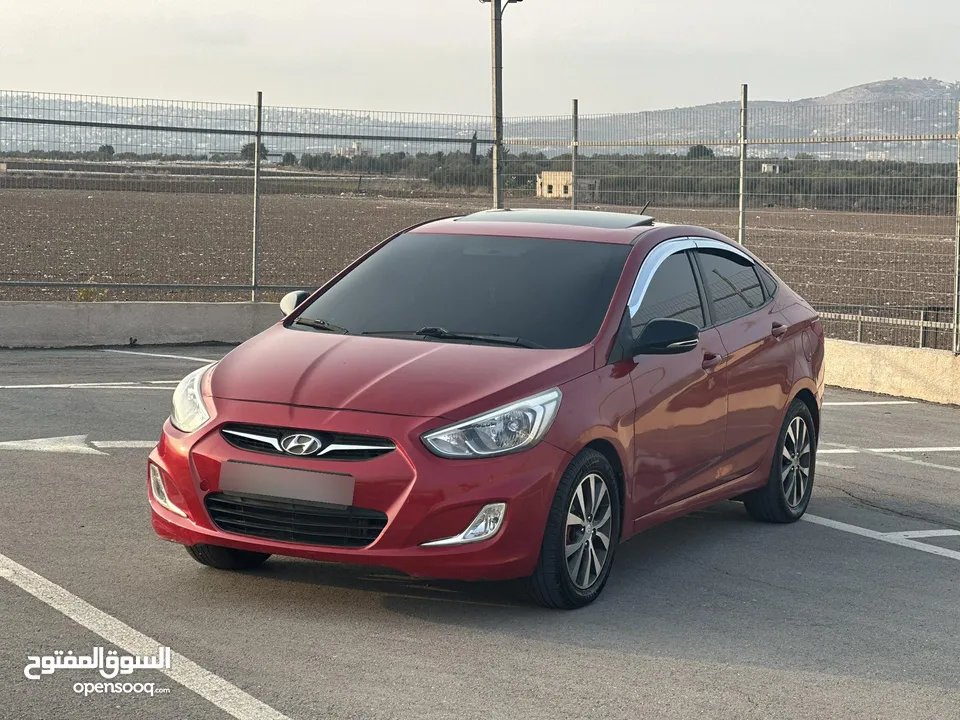 هونداي اكسنت /2014 فل فتحة سقف ديزل اتوماتيك 4 غيار كاملة الإضافات و المميزات