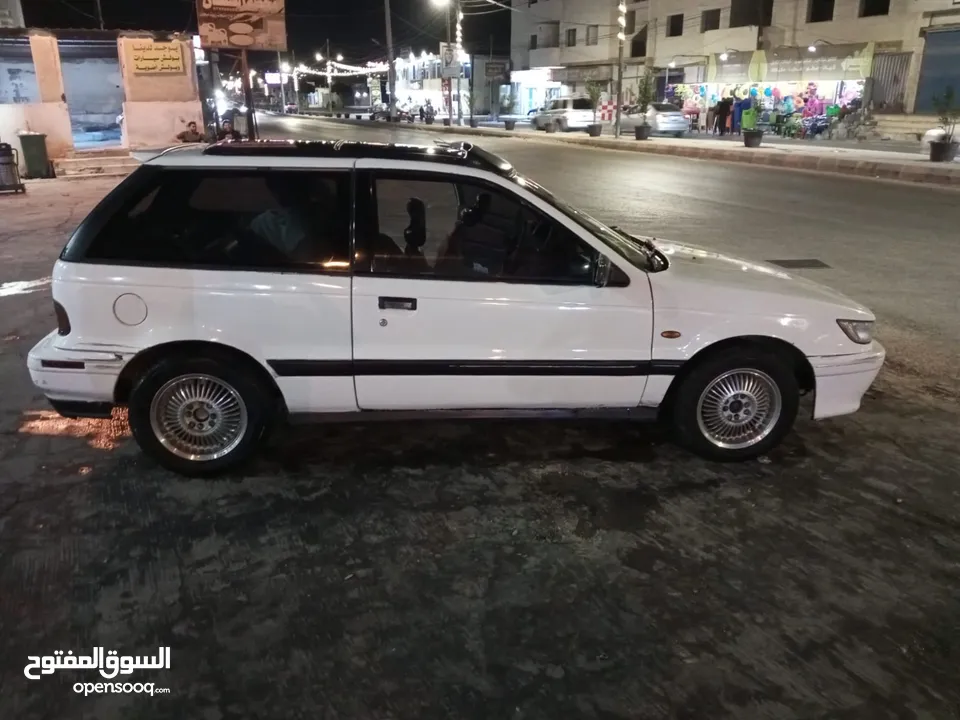 متسوبيشي ميراج 1990 ابيض باب واحد