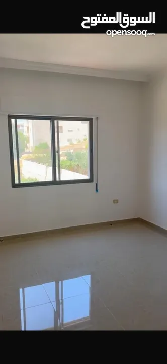 Excellent natural light and winds with views of Shafa Badran from the highest level in the building.