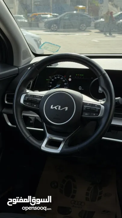 كيا سبورتاج ترخيص 2022 محرك 1600 هايبرد plug in/يقطع على الشحنه 65 كيلو متر  271 حصان