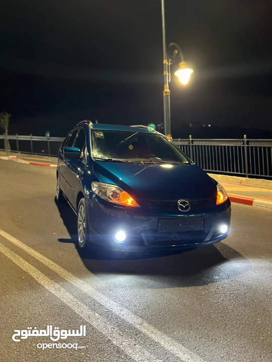مازدا 5 جير عادي 6+1 متور 2000 بنزين رخصه و تامين جديد  عداد قليل فحص نخبب سعرر كااششش