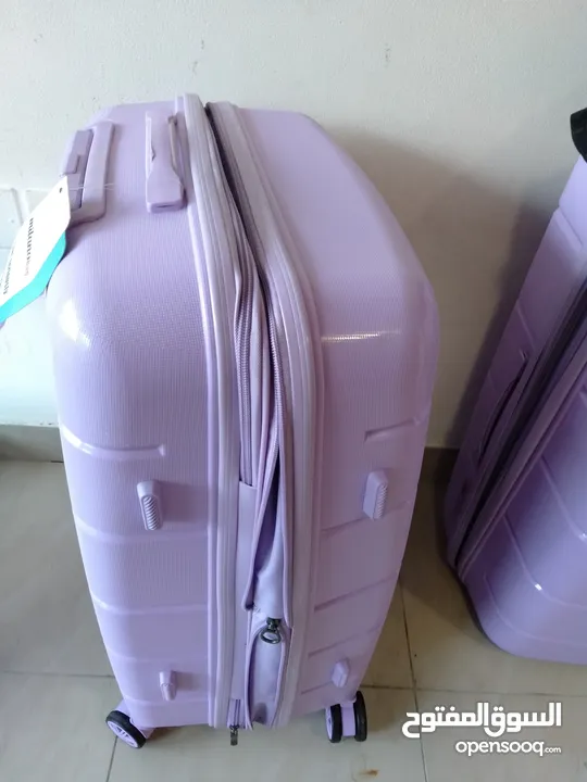 purple suitcase used once