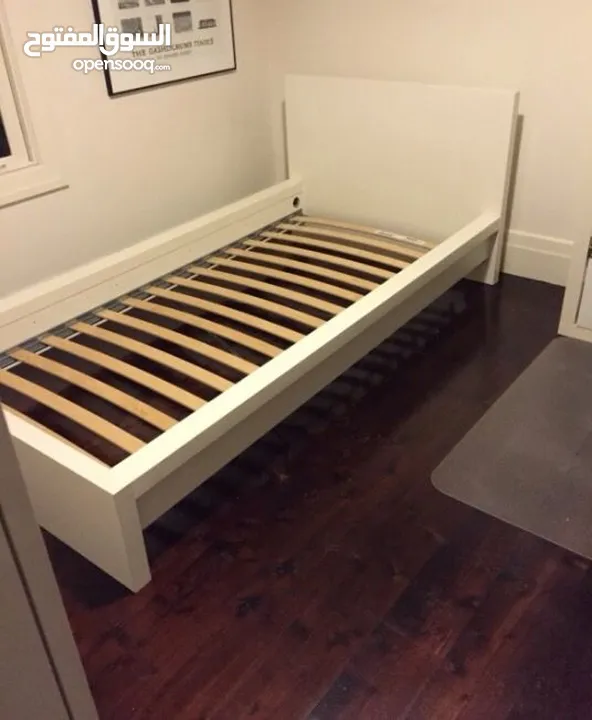 IKEA MALM bed frame/white with mattress and bed sheet.