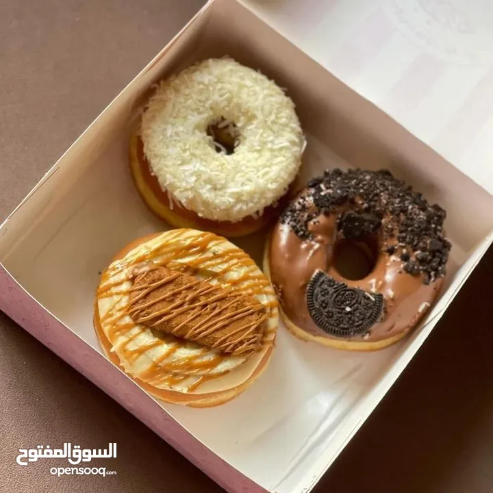 (رشة سكر)بتوفر توزيعات حلو للمناسبات دونات بأفخم الزينه تشيز كيك لوتوس كريب
