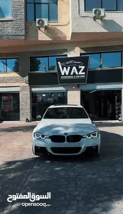 BMW330e ابيض لؤلؤي