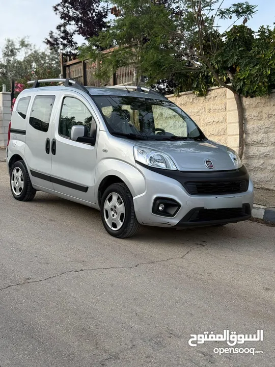 فيات كوبو جير عادي ماتور 1400 بنزين مش ديزل يعني بدون مشاكل فحص نخب وكلشي فيها تمام إمكانية البدل