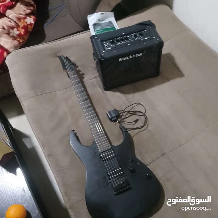 Ibanez electric guitar with amplifier