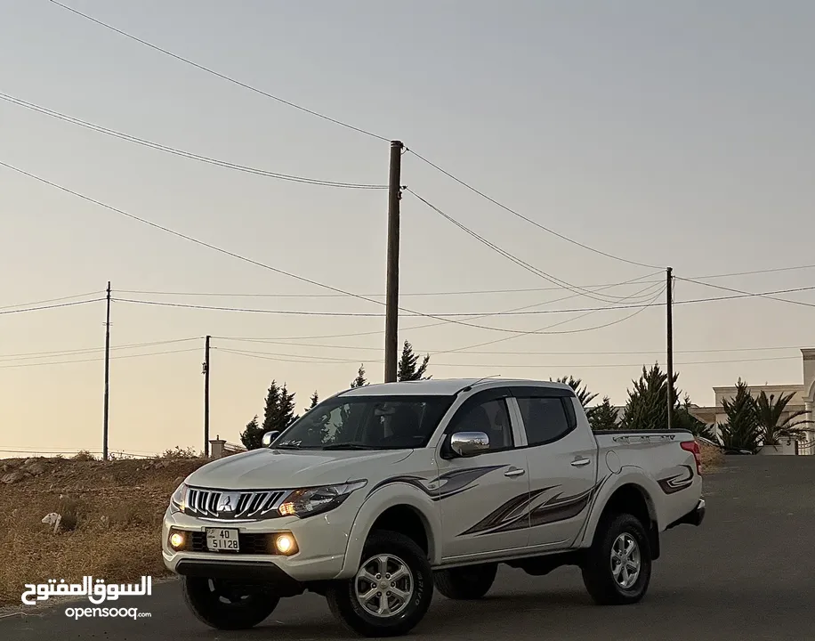 ميتسوبيشي L200 2016 لون ابيض مميزه فحص كامل كرت ابيض دفع رباعي 4x4