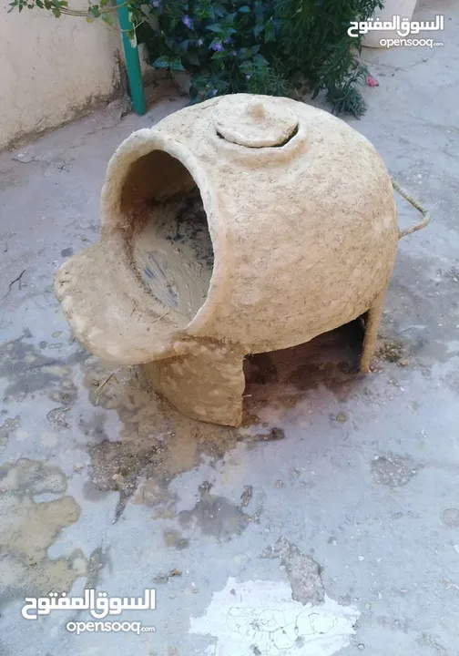 فرن طابون متحرك صنع من طين