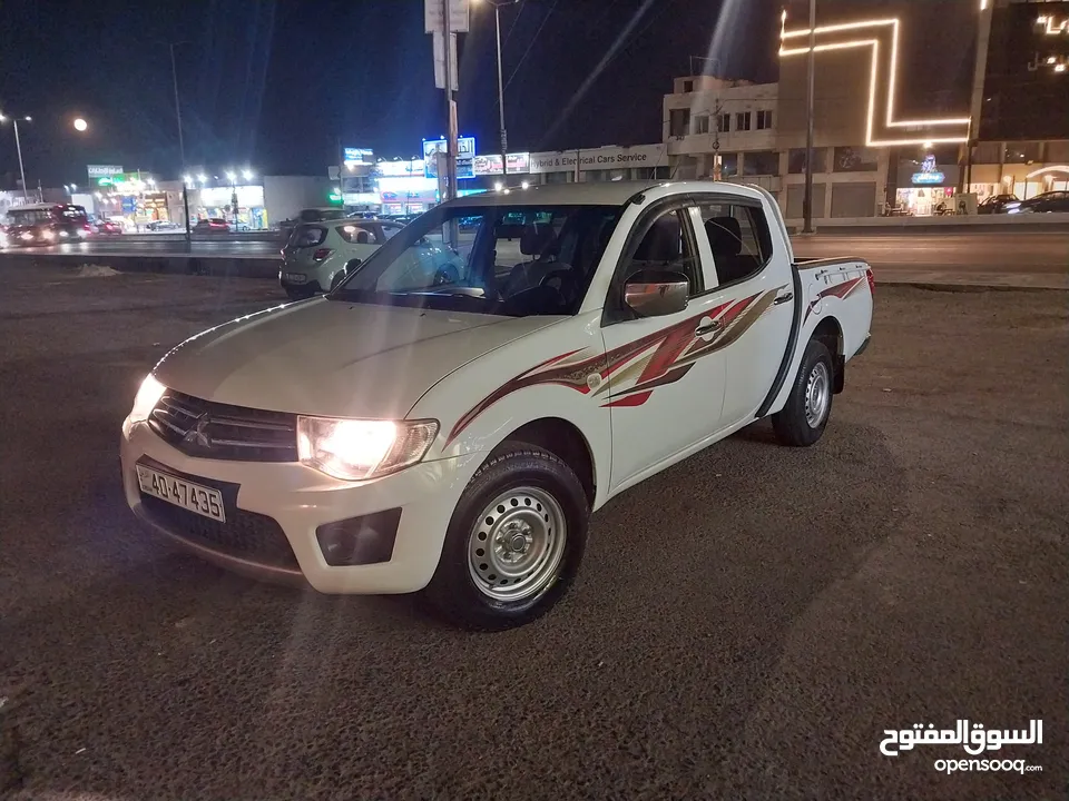 ميتسوبيشي L200 موديل 2015 واطي بنزين بحاله الشركه