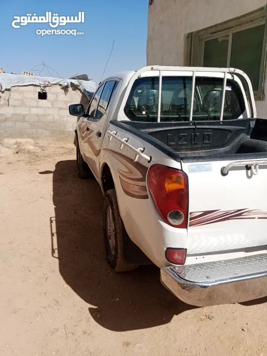 بك اب متسوبيشي   l200 موديل 2009 فور ويل 4X4