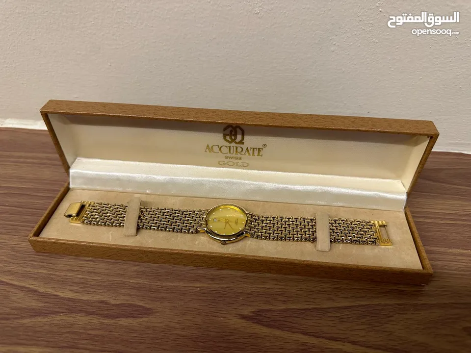 ساعة اكيوريت سويسرية مطلية بالذهب عيار 22 سويسرية الصنع مقاومة للمياه