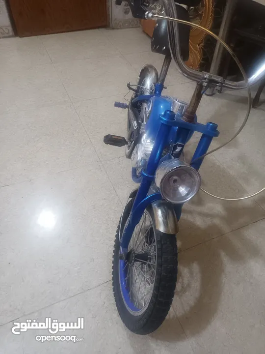 بايسكل على شكل دراجه ناريه للبيع وبي مجال أقره الوصف