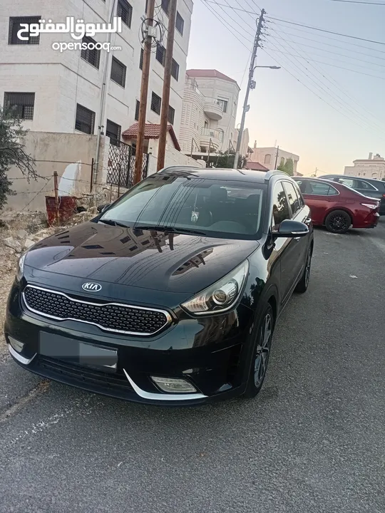 كيا نيرو كحلي ميتالك 2018