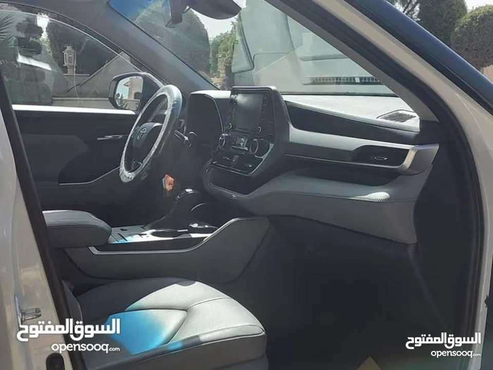 تويوتا هايلاندر 2021 فحص 2 جيد فل الفل بفتحه لون ابيض لؤلؤي بسعر مغري قابل للبدل