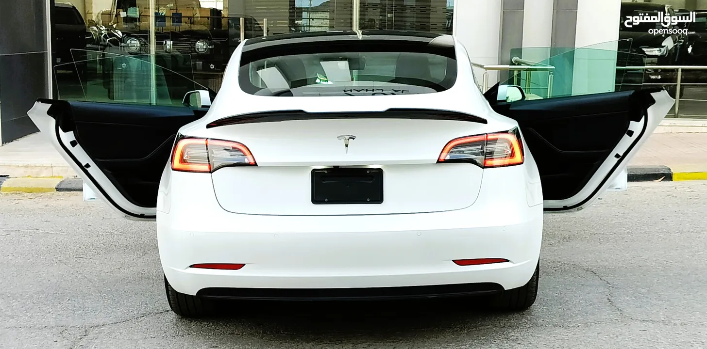 تيسلا 2022 model 3 فحص كامل 4 جـــيـــد بدون ملاحظات بودي (كرت ابيض) بحالة الوكالة بسعر لقطة ومحرووق