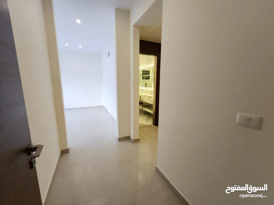 شقة طابقية فاخرة للبيع في عبدون ref : 14384