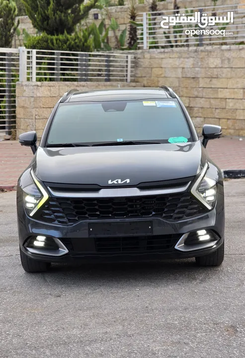 كيا سبورتاج هايبرد 2023 / فل كامل مع بانوراما وفرش مميز غرفه عسليه / عداد قليل / سعررر مميز جداً