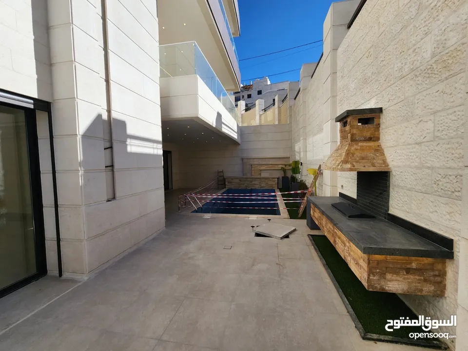 شقة طابقية فاخرة للبيع في عبدون  ref : 14383