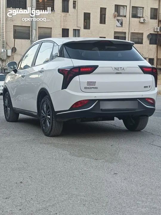 نيتا v موديل 2023 لون ابيض لؤلؤي فحص كامل جمرك حديث اتسكور 89% فحص soc 100% استخدام شخصي مثبت كارسير