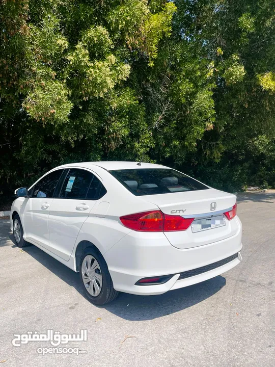 # HONDA CITY ( MODEL - 2019) WHITE COLOR SEDAN CAR 35 66 74 74