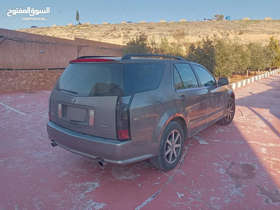 كاديلاك موديل 2004 بحالة الوكاله مرخصة لشهر 12 ماتور جديد بيان جمركي ما نزل ع رخصه لسه