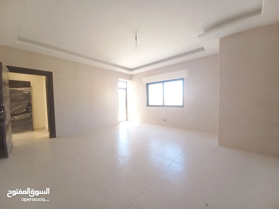 Unfurnished Apartment with Roof For Rent In Abdoun  ( Property 34122 )-174813184