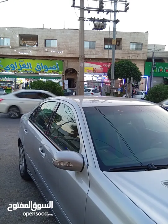 مرسيدس للبدل على احدث e200 كرت ابيض 2004