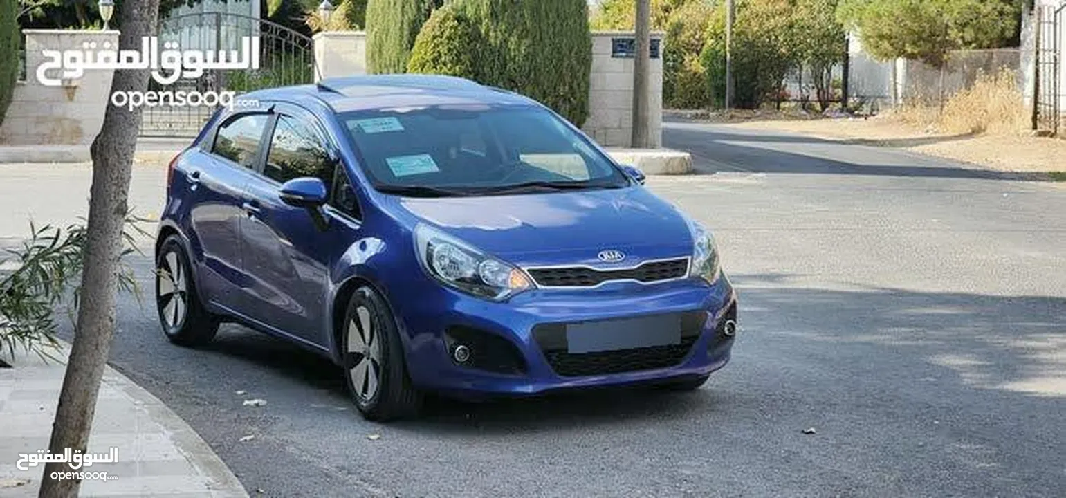 KIA RIO 2012 كيا ريو 2012 هاتش باك فل كامل مع فتحه أعلى مواصفات