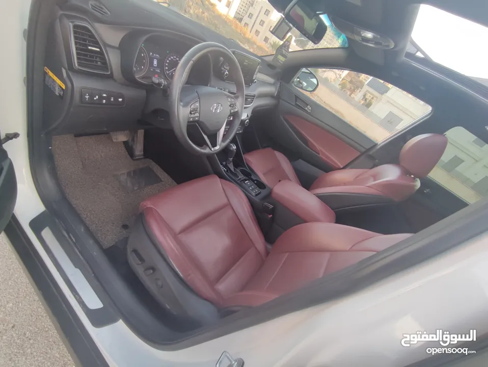 هونداي توسان فل الفل اضافات دهان شركة وعداد أصلي 70000كم فقططط رخصة وتأمين شامل للبيع بسعر مغري