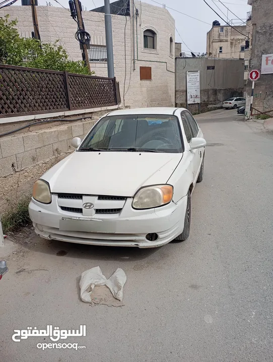 سيارة هونداي فيرنا 2003ميكانيكيات جيدة جدا وعيوب بسيطة بالبودي