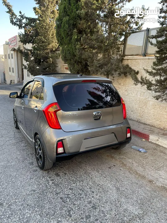 كيا مورننغ جي تي مع فتحة