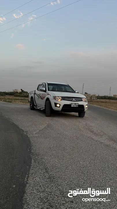 ميتسوبيشي L200 واطي دفع خلفي وليس رباعي