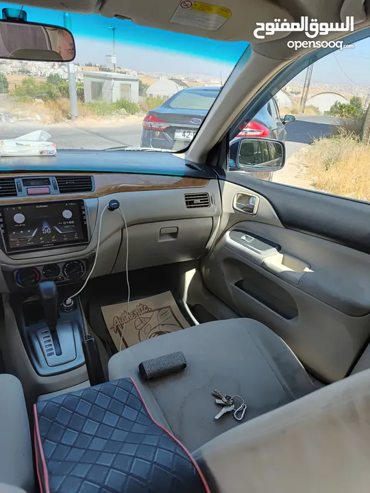متسوبيشي لانسر GLX 2007 1600 cc وارد الخليج الكويت جميع الإضافات بإستثناء الفتحه وجنط إضافي.