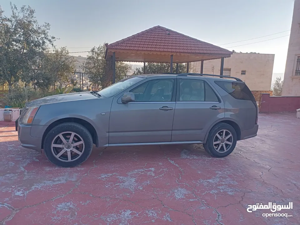 كاديلاك موديل 2004 بحالة الوكاله مرخصة لشهر 12 ماتور جديد بيان جمركي ما نزل ع رخصه لسه