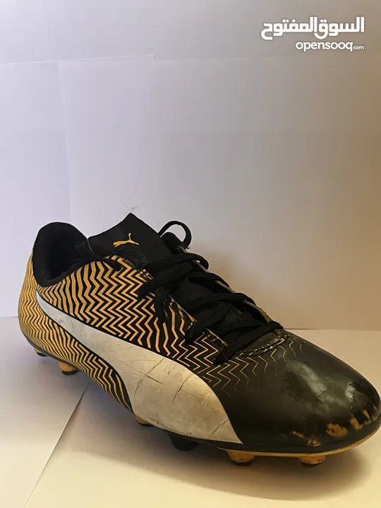 Unisex Puma kids football shoes (yellow) -  حذاء اطفال لون اصفر لكرة القدم (صالح للجنسين)