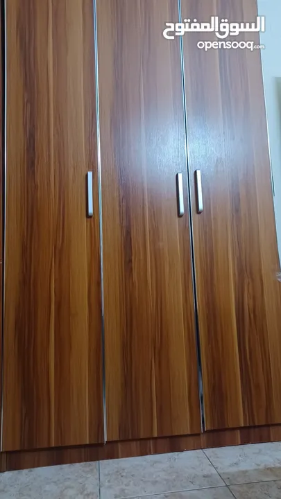 wooden 3 door cupboard