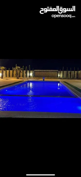 (مزرعه للايجار اليومي والحفلات اكبر بركه سباحه بالمنطقه 4 غرف نوم طريق المطار بالقرب من المطار