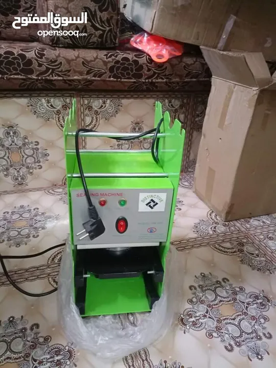 ماكنة غزل بنات مع مكبس كاسات استعمال بسيط مشروع كامل ودخل ممتاز سبب البيع السفر